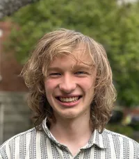 Headshot of Simon Juknelis